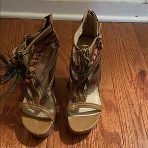 Call It Spring Tan and Brown Wedges with Feather Accent